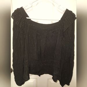 Of the shoulder shirt